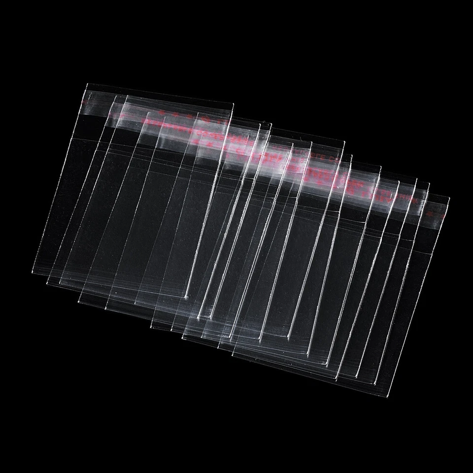 Bolsas de celofán OPP transparentes 1000 piezas bolsas de regalo envoltura joyería embalaje 70x50 mm Foto 4 de 4