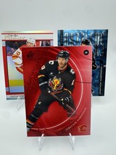 Jonathan Huberdeau Flames ft. 2025-26 SP Game Used, OPC premier, Blue Dazller