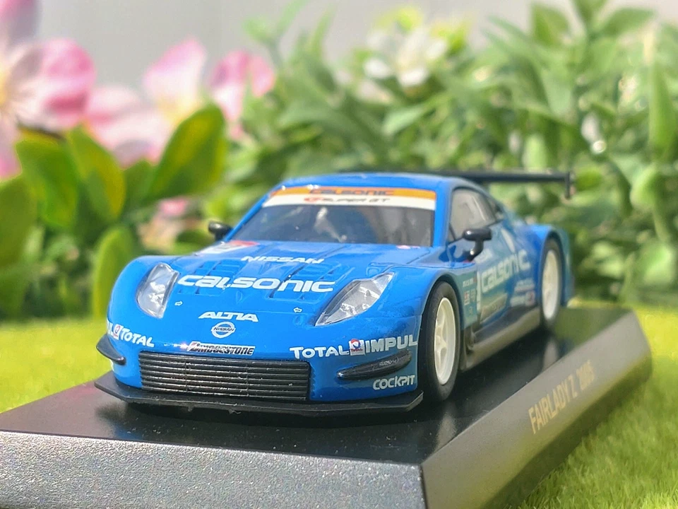 Super GT 2005 / Calsonic Fairlady Z / Nº12 B.Treluyer & Y.Ide / 1/64 / Kyosho Foto 3 de 4
