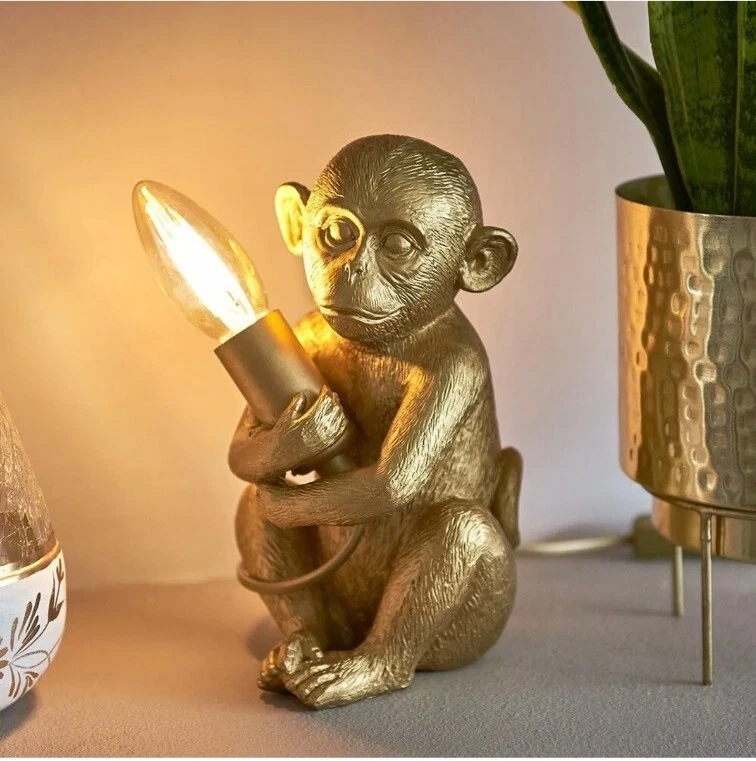 Animal holding cheap bulb lamp