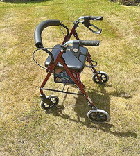 4 Wheel Rolling Mobility Folding Walker with Seat And Storage Maroon/Red