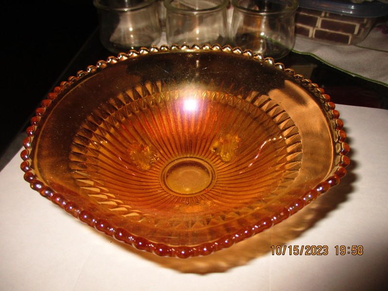 Iridescent Orange Three Footed Bowl / Candy Dish Jeannette Glass / Ruffled Edges