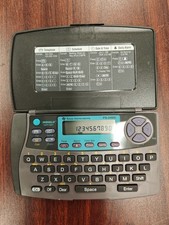Texas Instruments TI PS-2460i INDIGLO Data Bank, Scheduler, Calculator, Alarm