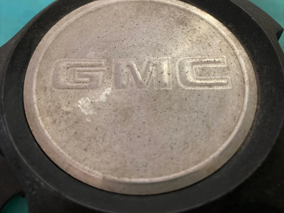 Tapacubos tapacubos GMC SAFARI VAN 1985-1995 15594373 15594372 NEGRO FABRICANTE DE EQUIPOS ORIGINALES OE Foto 2 de 4