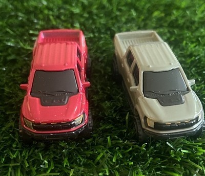 2 Maisto Ford F-150 SVT Raptor  Silver and Red Loose