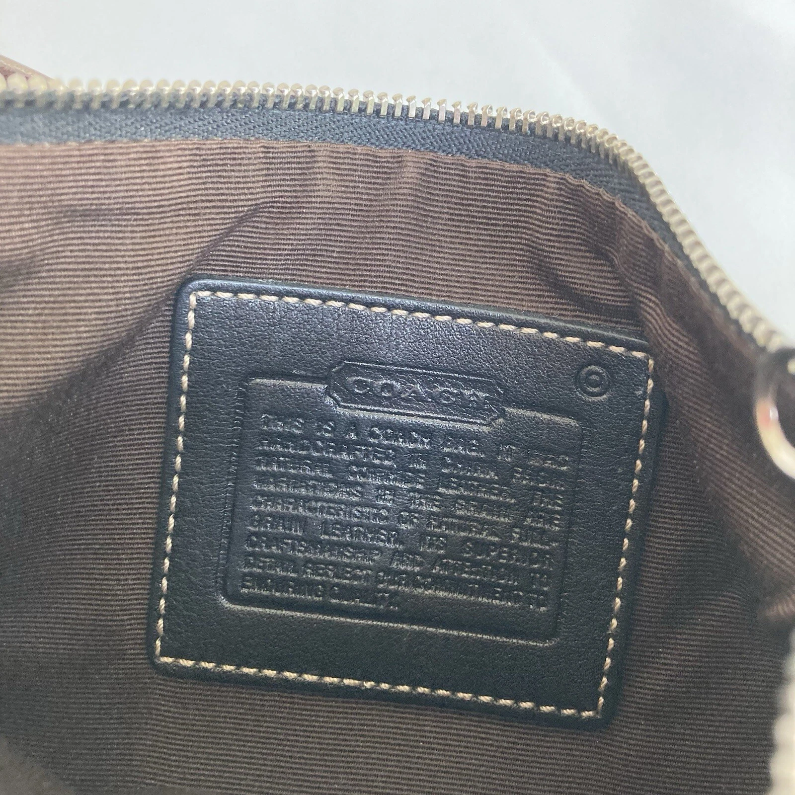 Borsa cambio polso Coach vintage anni 2000 in pelle Nera con bordo marrone