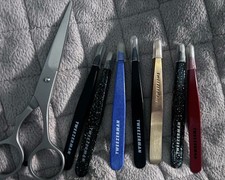7 Tweezerman Tweezers Available and One Pair Of Scissors 32.99 A Pair Average