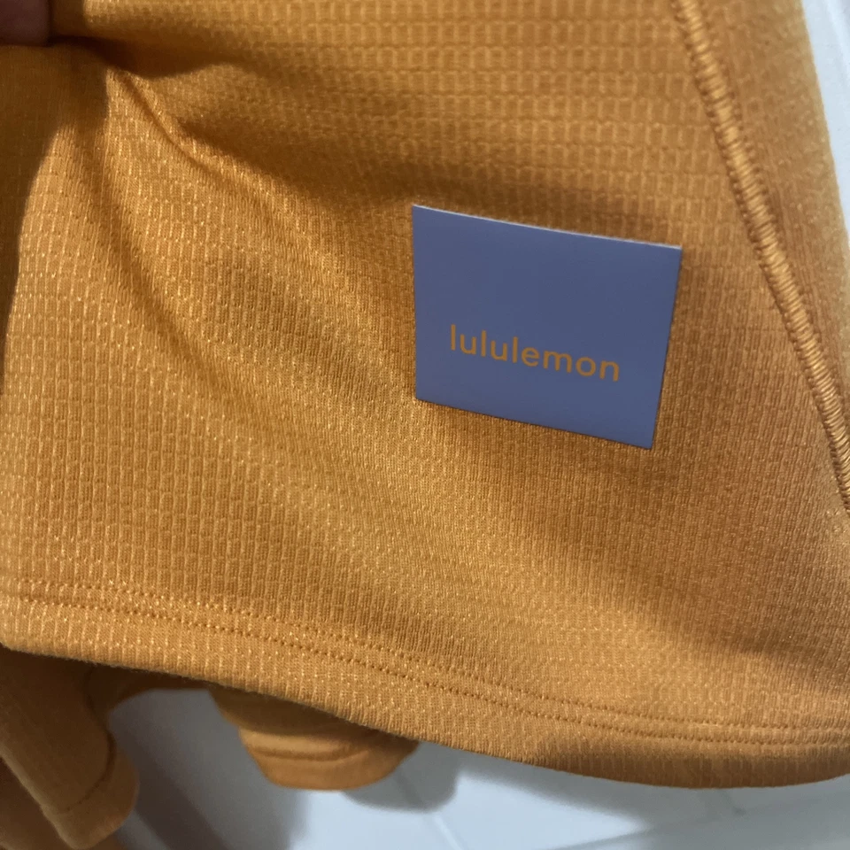Top LULULEMON Swiftly Tech Manga Larga Crew Naranja Talla 6 Foto 2 de 4
