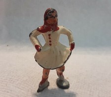 VINTAGE BARCLAY LEAD FIGURE SKATER GIRL RED WHITE SILVER 2 1/2"H