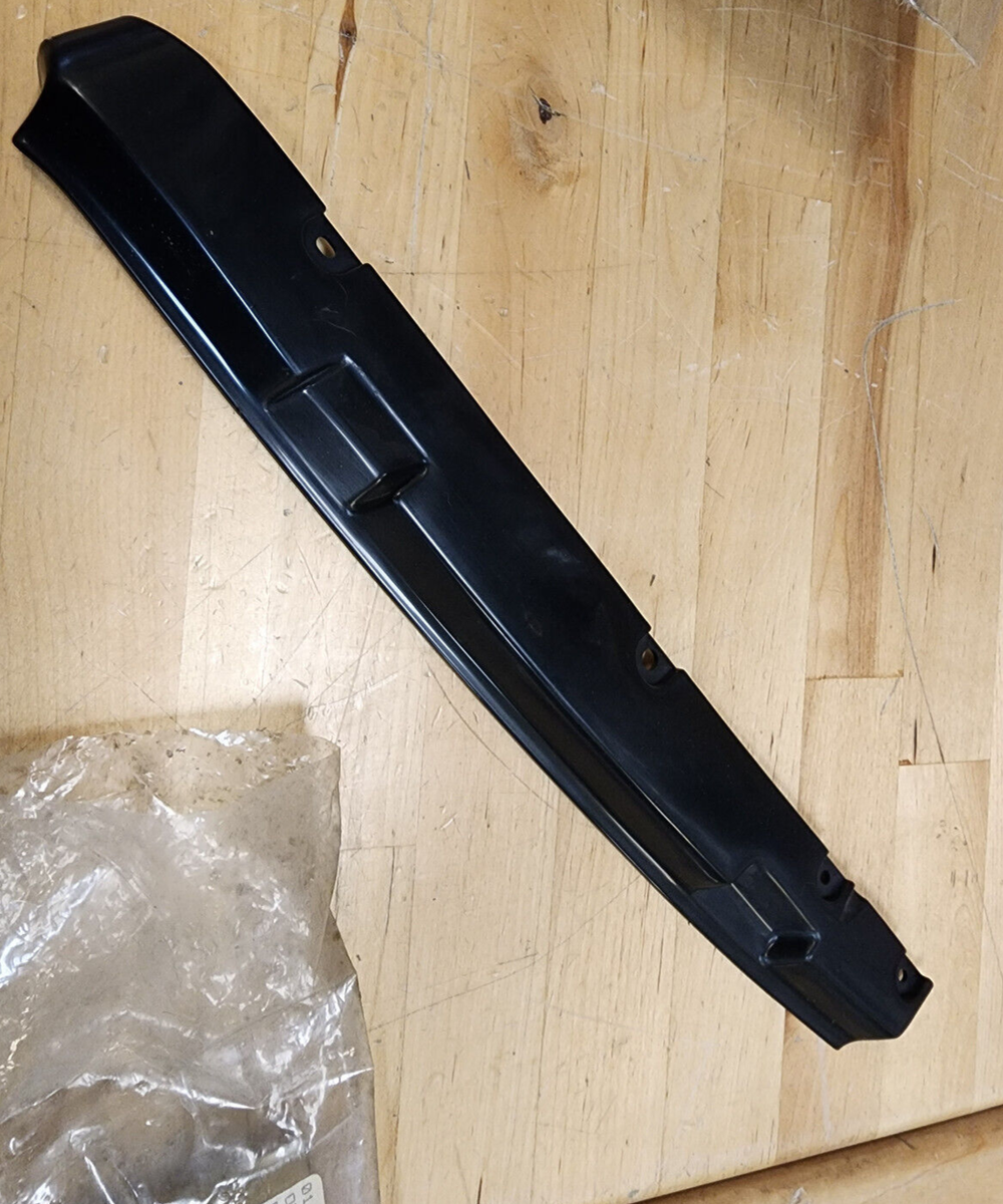 Mazda Factory New 929 Left Head Light Trim (HE21-51-0B9) 1988