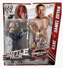 WWE DANIEL BRYAN AND KANE SIGNED BATTLE PACK 2 PACK WITH JSA COA VERY RARE