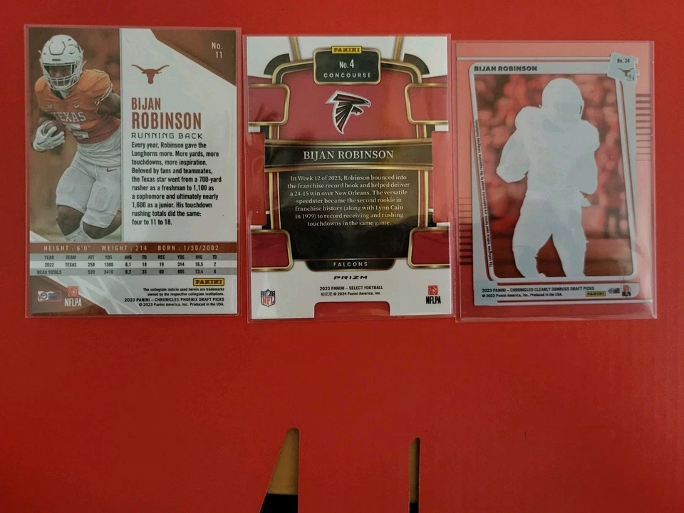 2023 Panini Select #4 Bijan Robinson  Die Cuts & 2 Chronicles  - Image 2 of 2