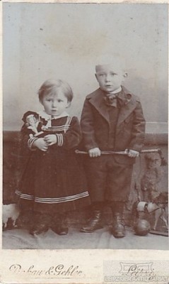 Portrait Two Children with Toys (Siblings), Photography. Photo Picture