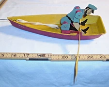 BARNACLE BILL SEA CAPTAIN ROW BOAT TIN WIND UP TOY EMMETT HAMMES & CO. 1930s