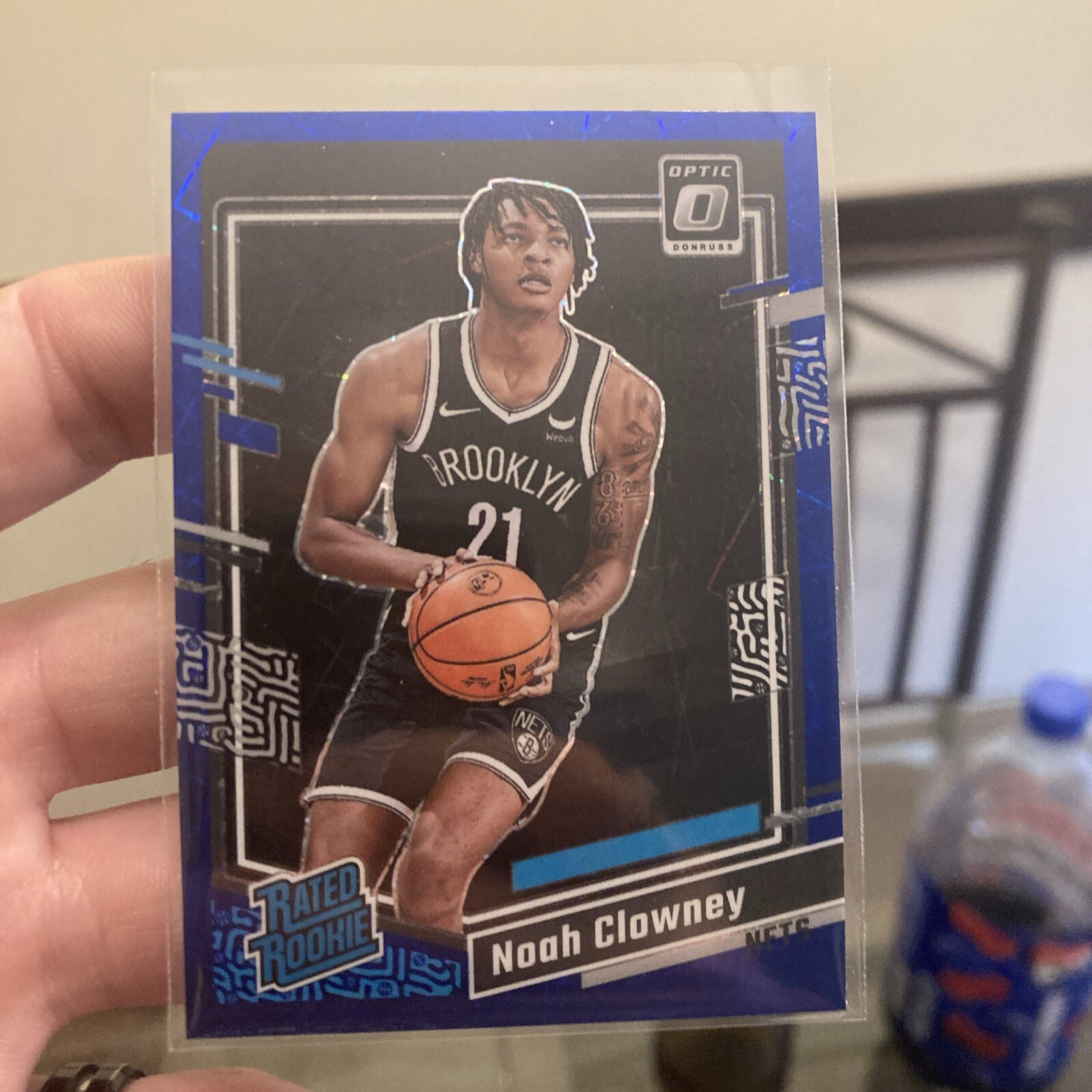 2023-24 Panini Optic - Rated Rookie Blue Velocity Prizm #205 Noah Clowney (RC)