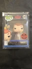 Funko Pop! Vinyl: Stranger Things - Freddy Funko as 001 in hard stack.