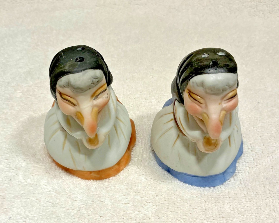 Actual vintage 1980s Baba Yaga witch babushka salt & pepper shakers — the kind of wonderfully weird kitsch that stops guests cold and sparks a folklore conversation.