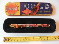 Stylo à roulettes céramique Coca-Cola vintage 1995 en étain collector