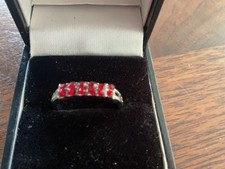 BEAUTIFUL 5 RED STONE SILVER PLATED RING SIZE O