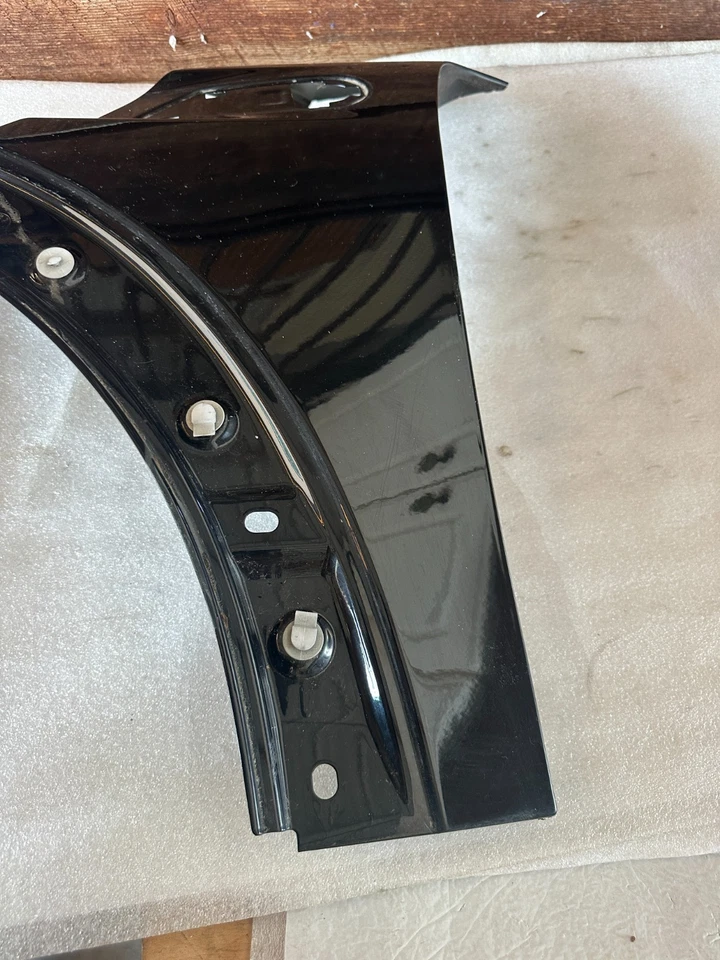 MINI COOPER S HT/CONV 2007-2015 guardabarros delantero izquierdo sin destellos OEM negro Foto 2 de 4