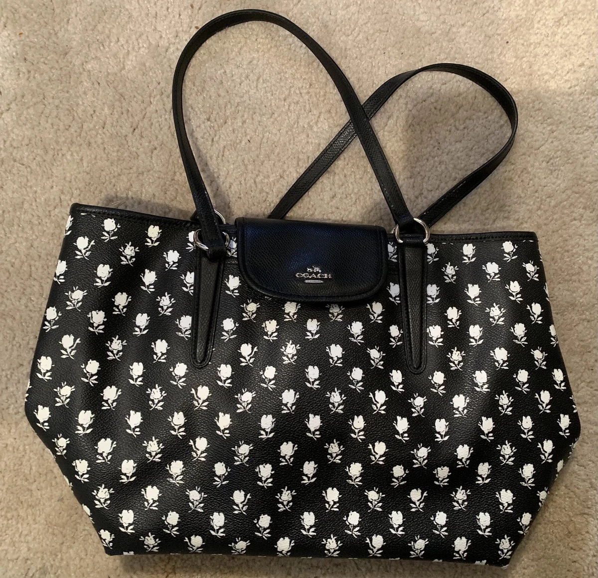 White purse with clearance flowers