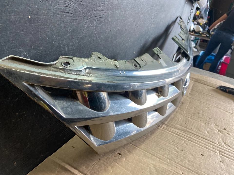 Nissan Murano 2003 2004 2005 parrilla superior delantera O1169 DG fabricante original Foto 3 de 4