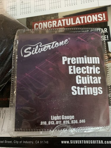Silvertone SS11 Electric Guitar with Case, Amp, Extra Strings, Picks Tuner Black - Picture 8 of 9