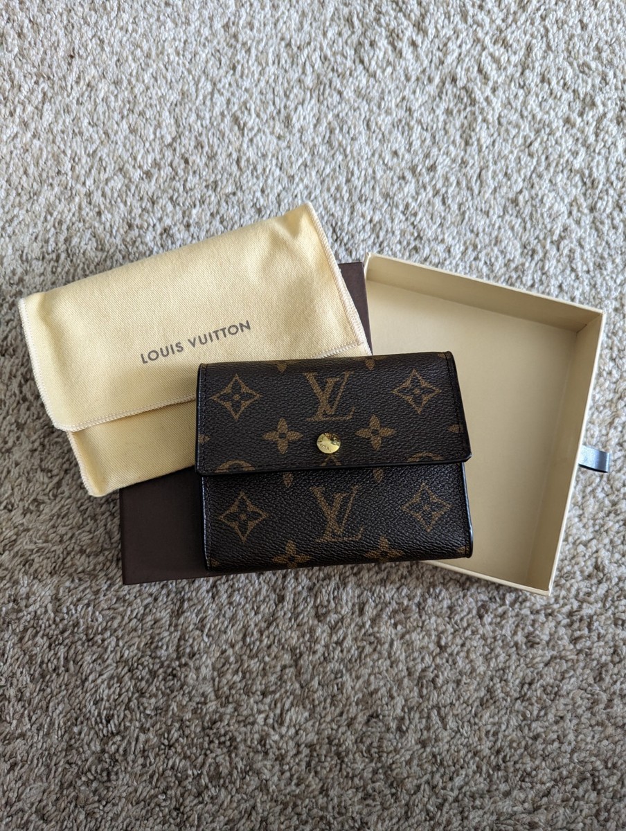 Louis Vuitton Womens Monogram Coated Canvas Button Trifold Wallet