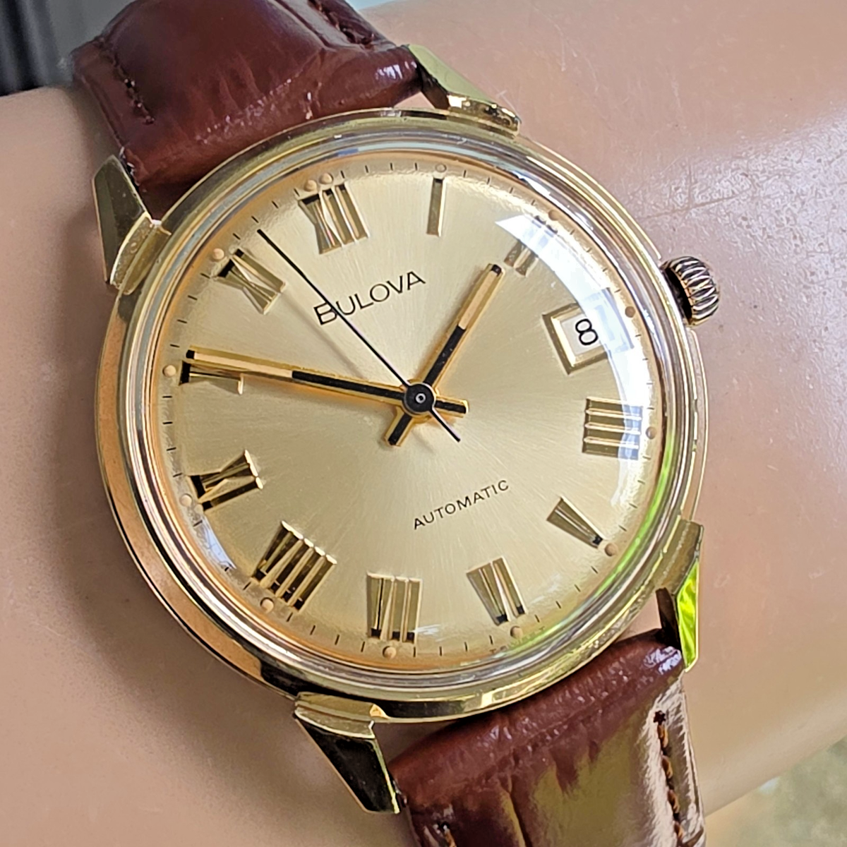 Vintage BULOVA men's automatic watch Date 11AOACD Roman numerals