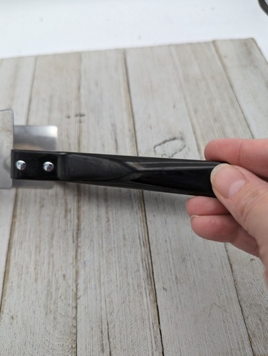 Affettatrice per torte in acciaio inox 10'' fiore manico nero - Foto 7 di 8