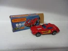 Matchbox Lesney Superfast SF64 Fire Chief- outlined shield, dark red, box tear