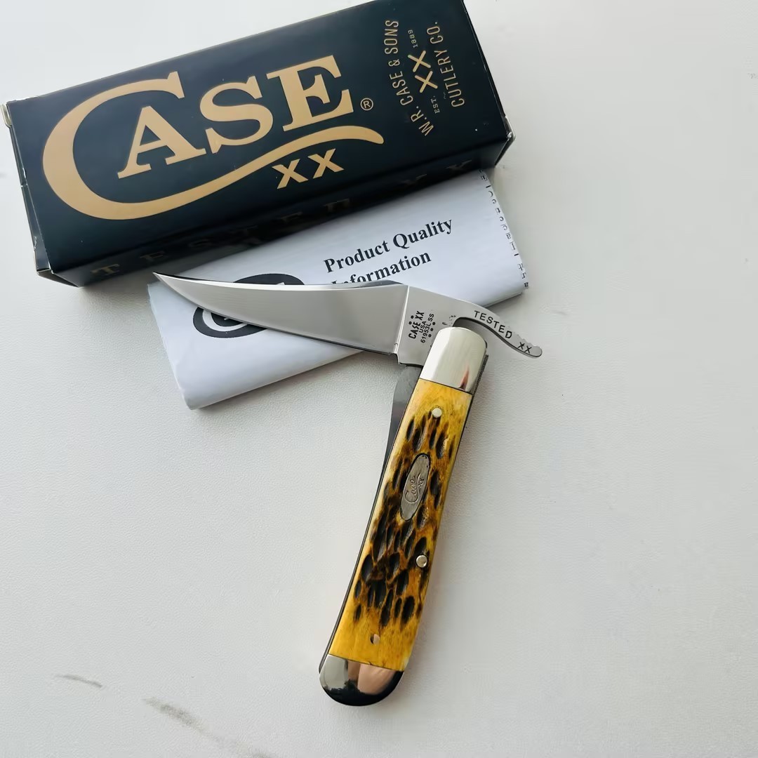 Case xx Peach Seed Jig Amber Bone RussLock® Stainless Steel Pocket