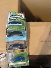 Greenlight 1/64 Ford Taurus 4 2 Blue 2 Black New