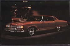 1975 Pontiac Grand Ville Broughem 4-door Hardtop Sedan Dealer Postcard 1975 Pontiac Grand Ville Broughem 4-door Hardtop Sedan Dealer Postcard