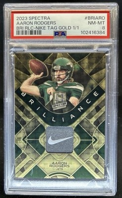 2023 Spectra Aaron Rodgers Brilliance Gold Laundry Tags Nike Patch #1/1 PSA 8