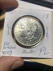 1885 P Morgan Silver Dollar. BU, Proof Like. Die Cracked Wing. Very Pretty Coin.