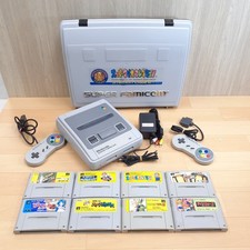 Japanese Super Famicom console with Mario Collection carring case  8 games