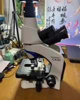 Olympus CX33 trinocular microscope With eyepiece and objective lens