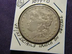 1894-O Morgan dollar with VF / XF details scratch on Libertys face
