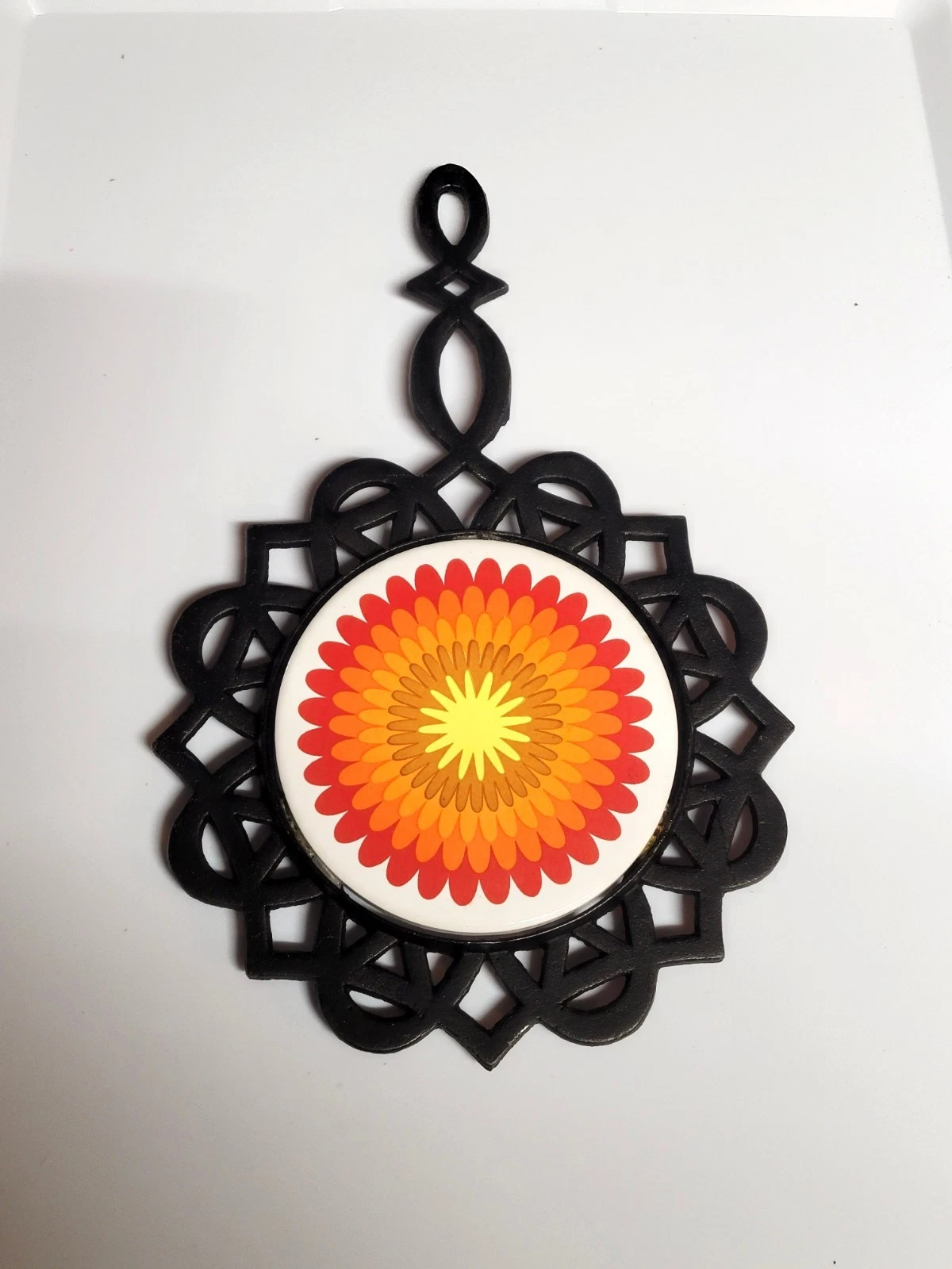vintage 1970s psychedelic floral cast iron trivet and hot pad - product detail image 3