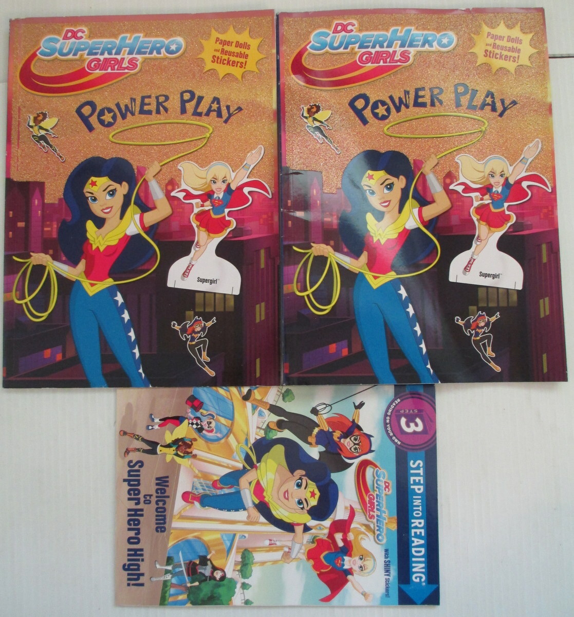 DC Super Hero Girls lot of 3 books 2 sticker 1 Step into