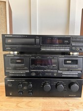 Pioneeer Amplifier, Dual Cassette Deck, And Cd Player.