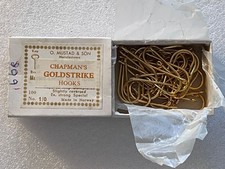 A box of Vintage Mustad & Sön Gold Hooks.