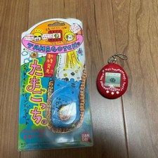 SHINSHU HAKKEN TAMAGOTCHI RED COLOR BANDAI 1997 JAPAN species discovered