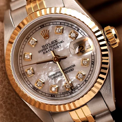 Ladies Rolex Datejust 26 mm White Mother of Pearl Diamond Dial