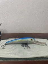 Vintage Large Fishing Lure Mann’s 8” Blue Back Yellow Eye Fish Magnum S-30+