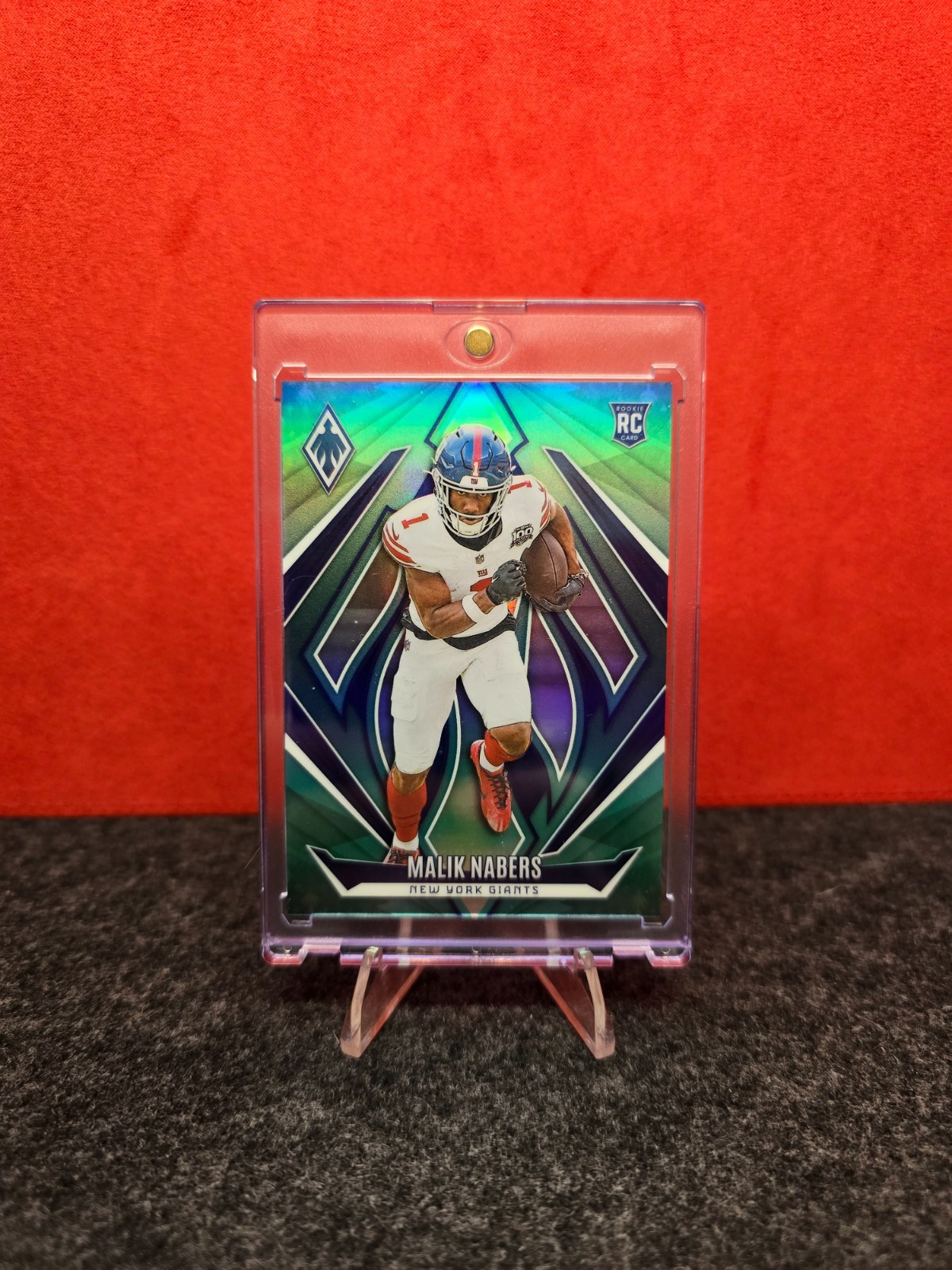 2024 Panini Phoenix - Rookies Malik Nabers #221 Teal /28 (RC)