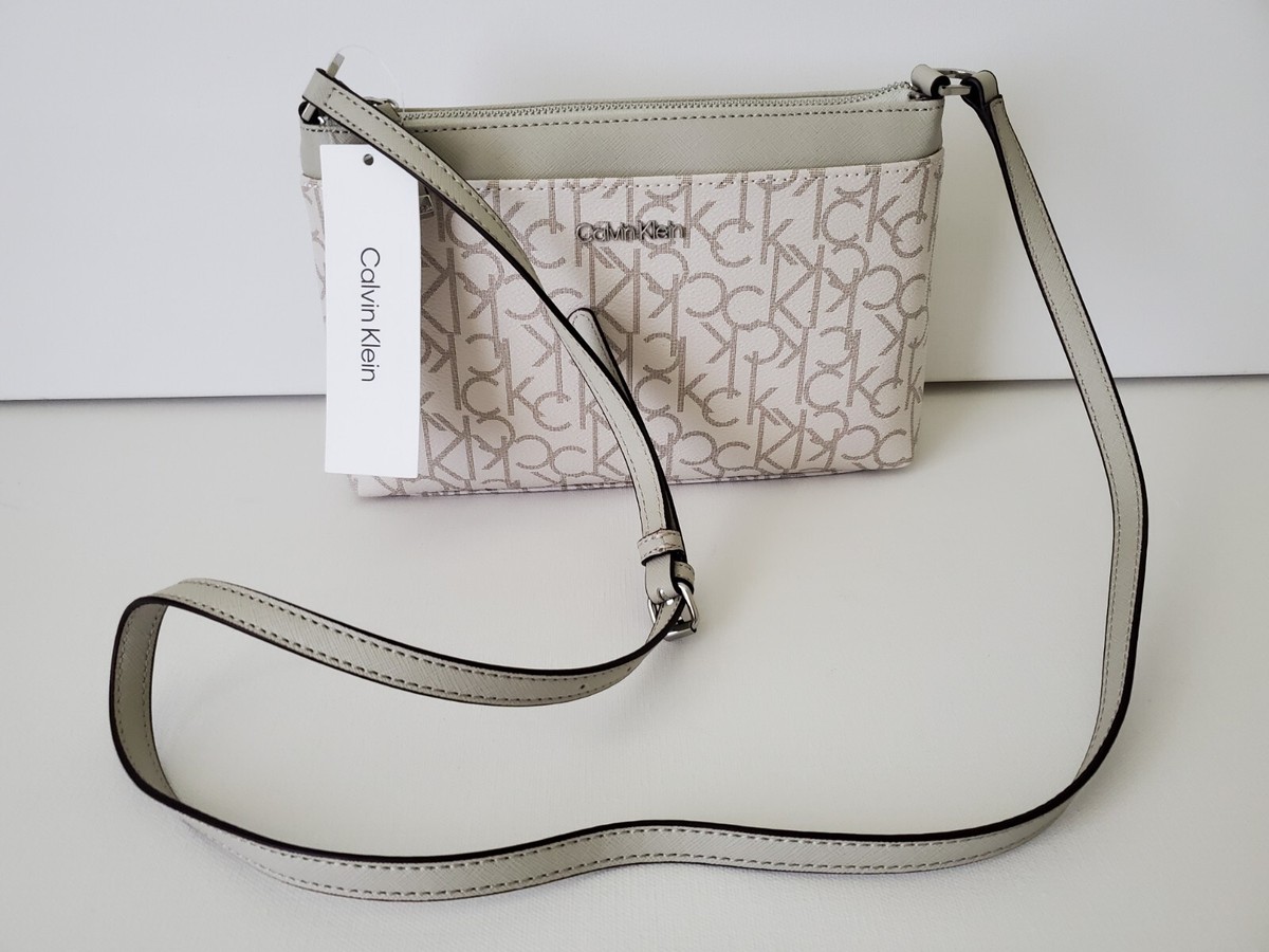 Calvin Klein Women's CK Logo Print Crossbody Small Bag Off White Grey Silver HW Calvin Klein Women's CK Logo Print Crossbody Small Bag Off White Grey Silver HW