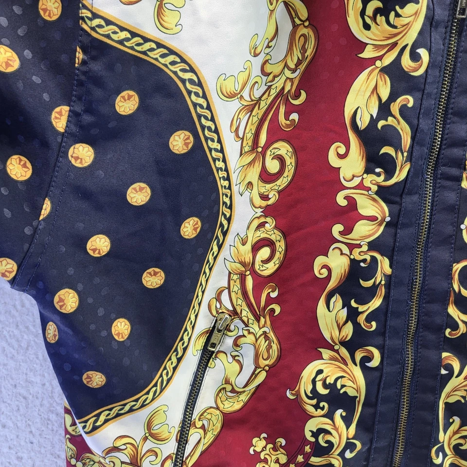 Chaqueta cortavientos Otello Pelle para mujer azul medio cadenas AOP dorada de gran tamaño Foto 4 de 4