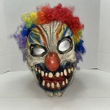 Scary zombie clown with big red nose latex mask and multi-color hair - Halloween